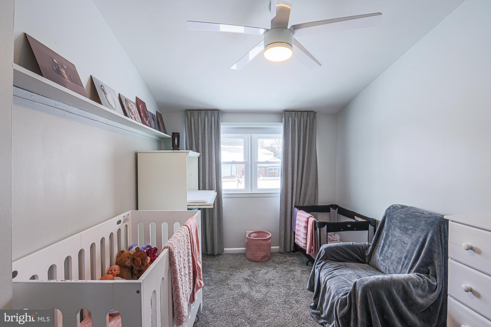 6600 Linco Avenue Baltimore, MD 21209 - Photo 6 of 21 Charming nursery with soft, inviting tones.