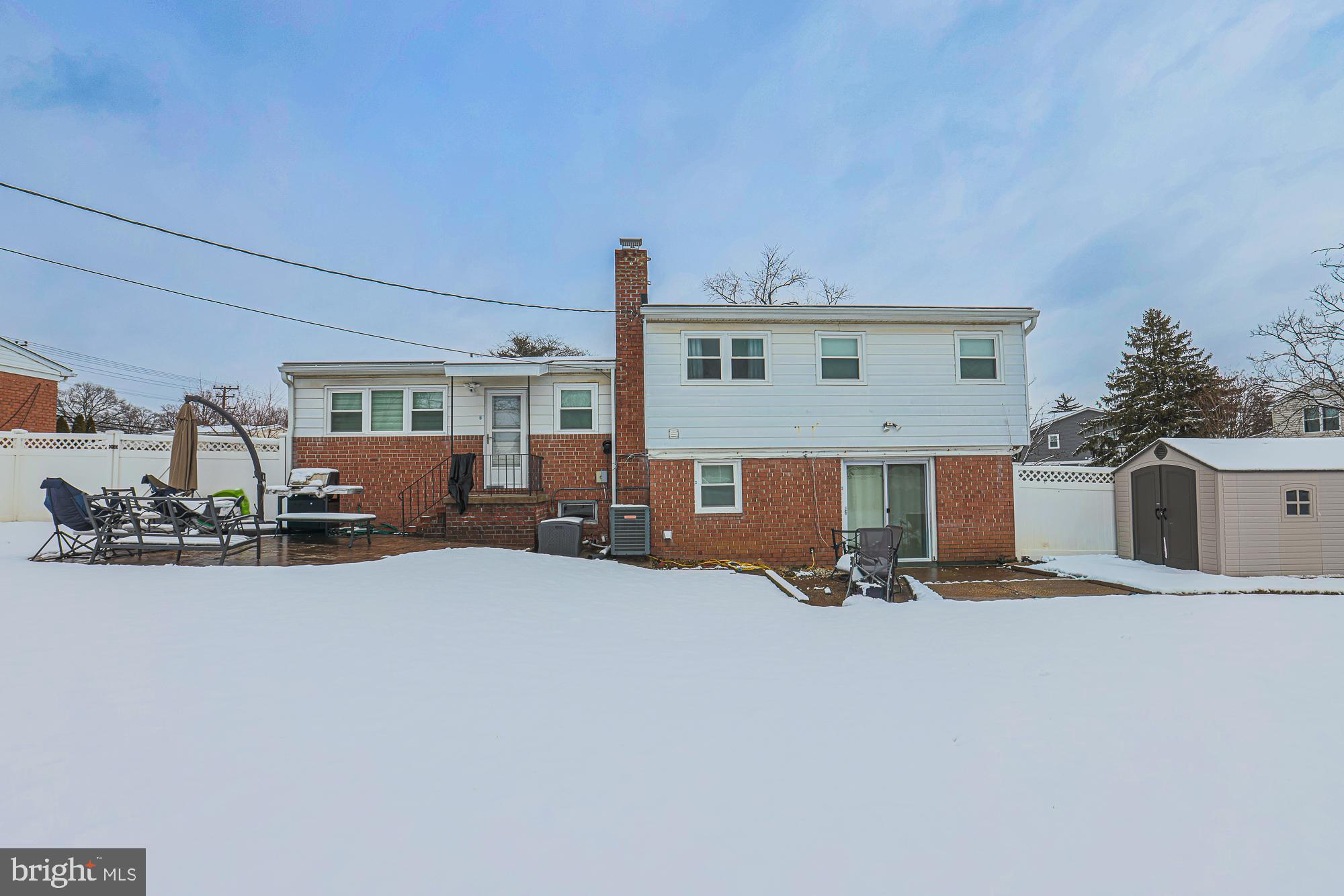 6600 Linco Avenue Baltimore, MD 21209 - Photo 8 of 22 a view of a livingroom with furniture and a fireplace