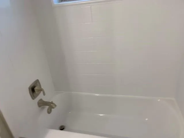 a close up of a bathtub