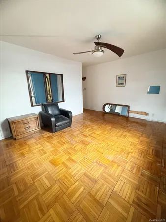 a bedroom with a bed and cabinets
