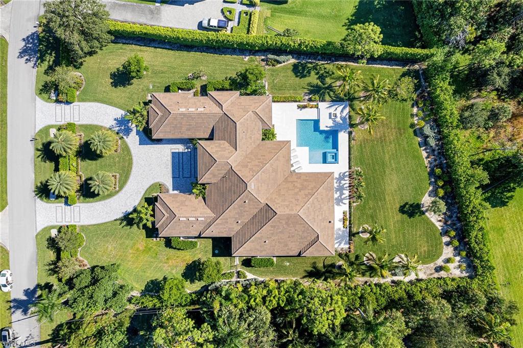 607 Myrtle Road Naples, FL 34108 - Photo 24 of 45 an aerial view of residential house with outdoor space and swimming pool