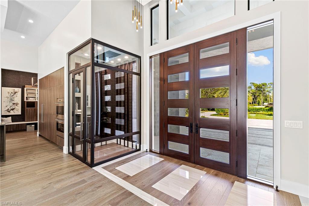 607 Myrtle Road Naples, FL 34108 - Photo 10 of 45 a view of an entryway with a balcony