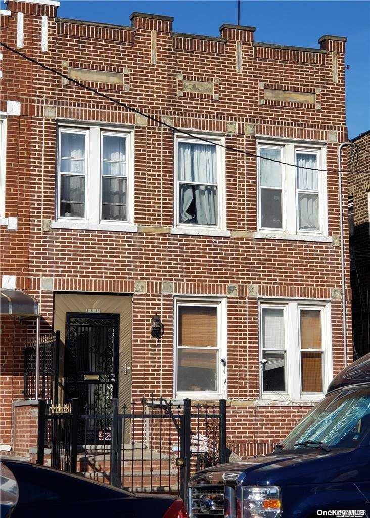 108-19 39th Avenue Queens, NY 11368 - Photo 1 of 1 a front view of a house