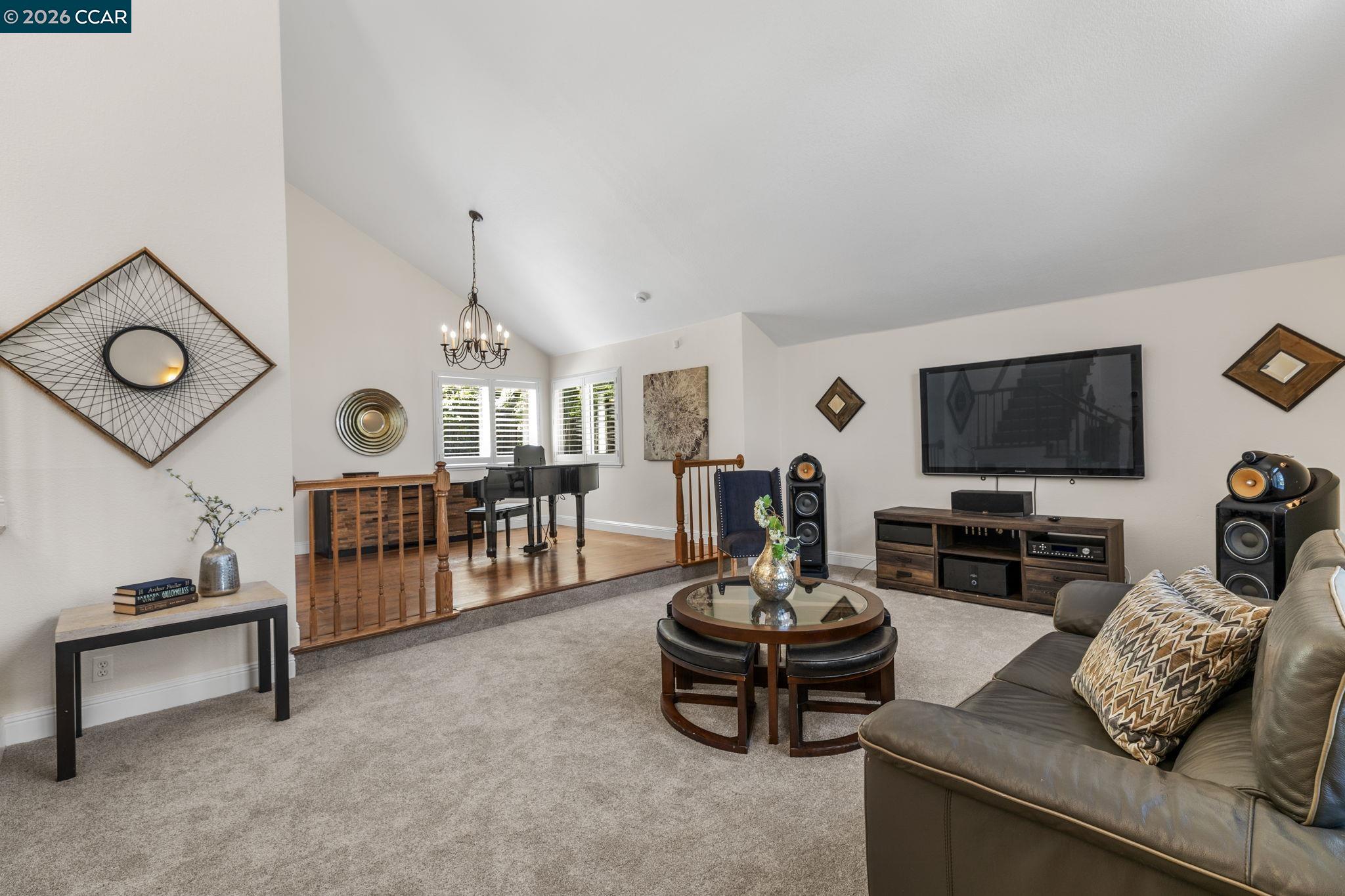 1267 Quiet Circle Concord, CA 94521 - Photo 11 of 72 a living room with furniture and a flat screen tv