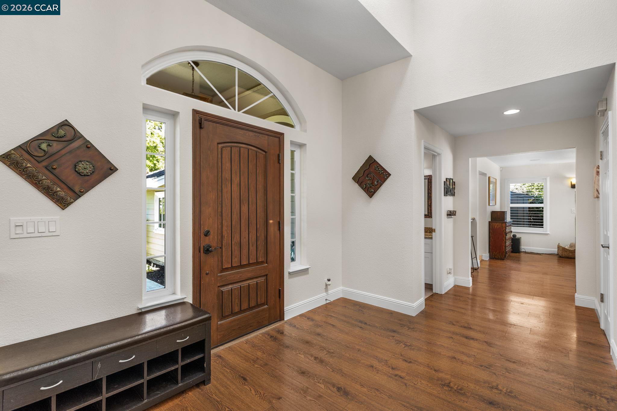 1267 Quiet Circle Concord, CA 94521 - Photo 4 of 72 a view of livingroom with hardwood floor and hallway