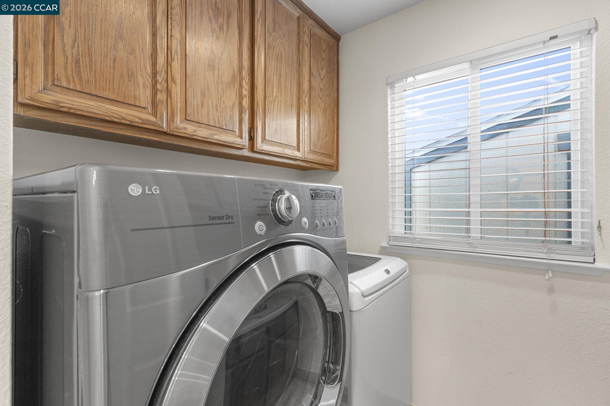 1267 Quiet Circle Concord, CA 94521 - Photo 45 of 72 a close view of a sink and a dishwasher in a bathroom