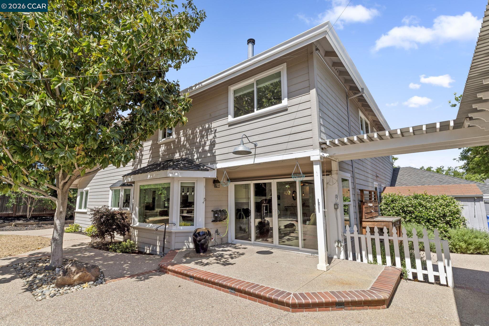 1267 Quiet Circle Concord, CA 94521 - Photo 55 of 72 a view of a house with backyard porch and sitting area