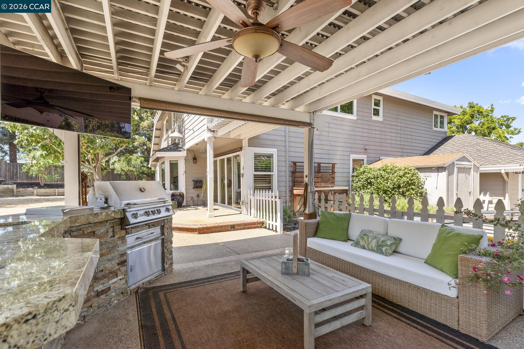 1267 Quiet Circle Concord, CA 94521 - Photo 58 of 72 a view of a patio with couches table and chairs and potted plants