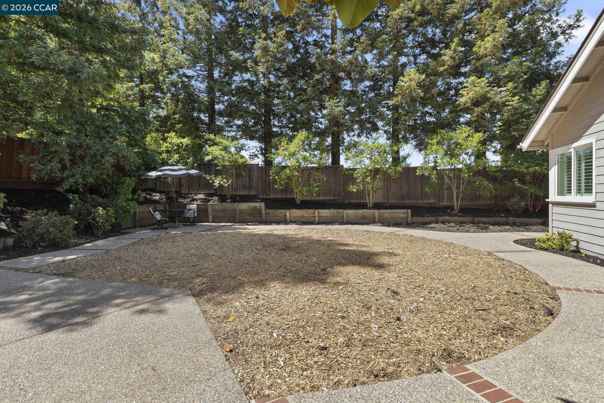 1267 Quiet Circle Concord, CA 94521 - Photo 62 of 72 a view of a backyard with large trees