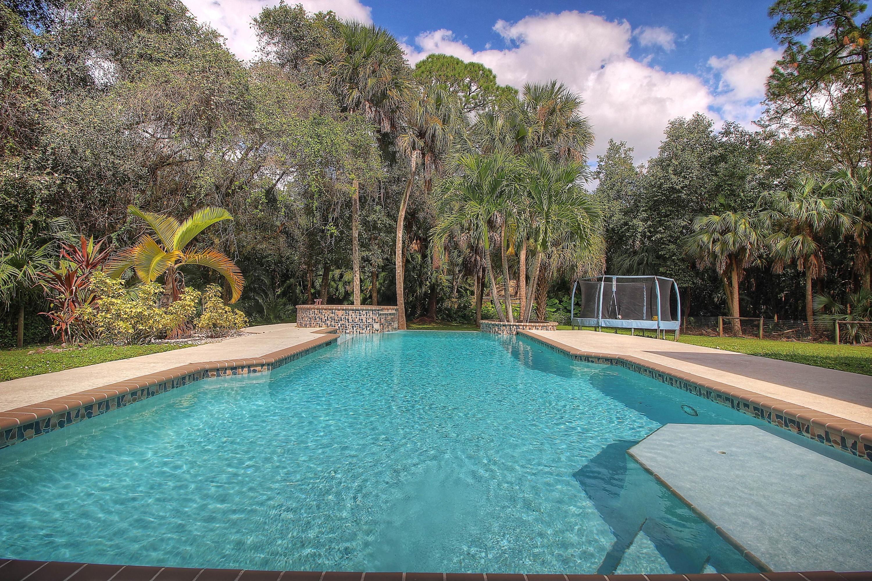 9461 Sandy Run Road Jupiter, FL 33478 - Photo 34 of 47 Pool Patio 2 MLS