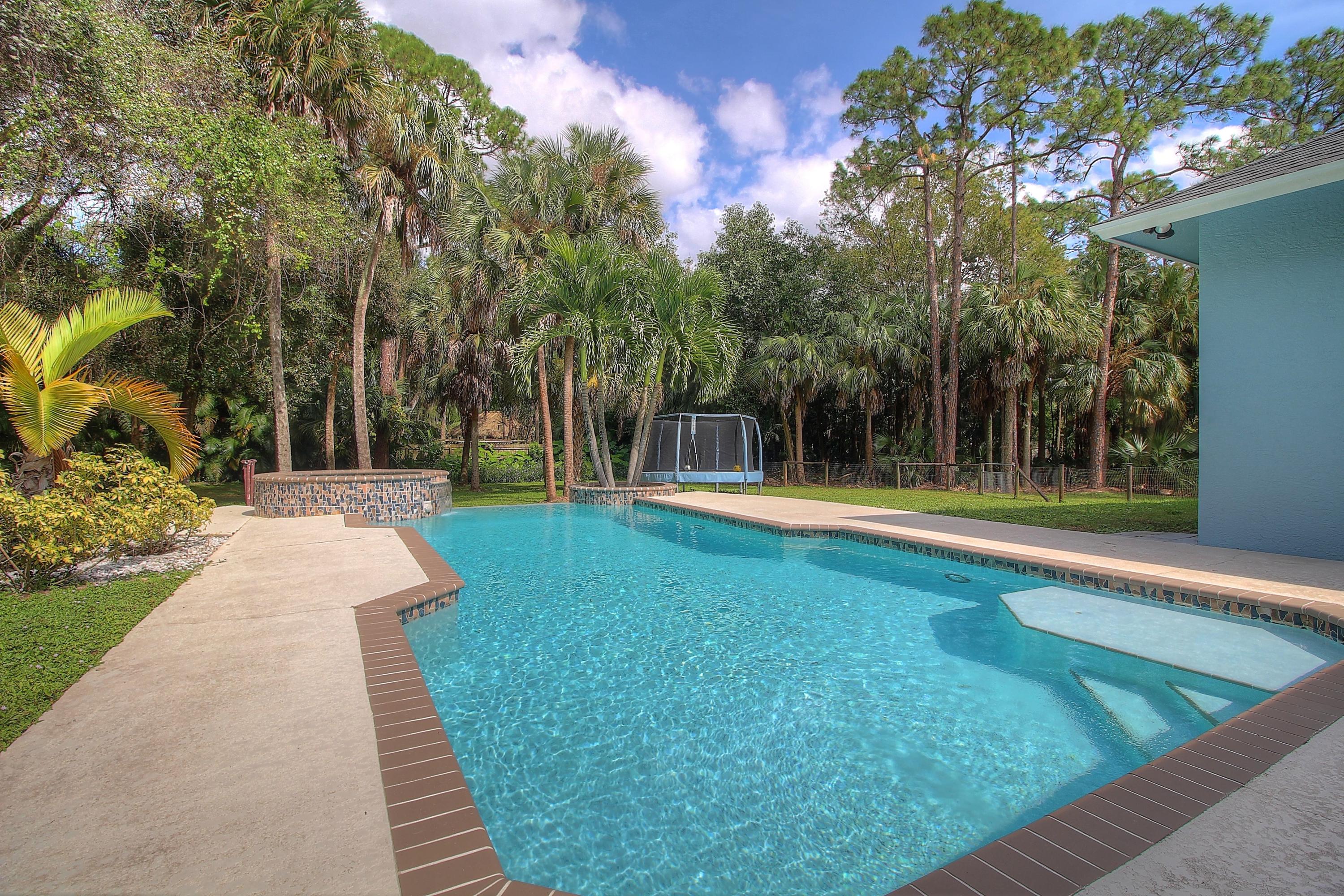 9461 Sandy Run Road Jupiter, FL 33478 - Photo 35 of 47 Pool Patio 3 MLS