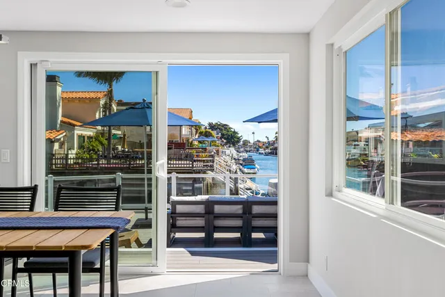 a view of entryway livingroom and hall with wooden floor