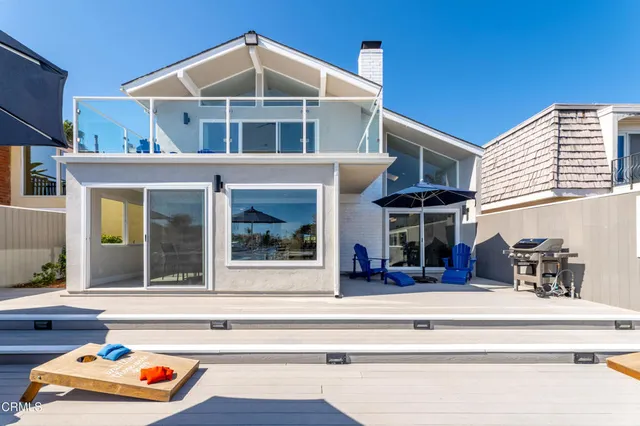 a room with gym equipment and a flat screen tv