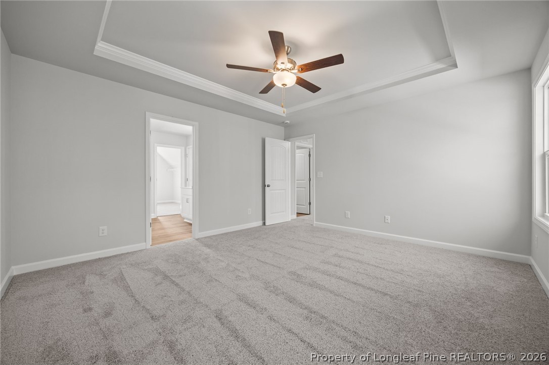 155 Michter Street Vass, NC 28394 - Photo 22 of 46 a view of an empty room and chandelier fan