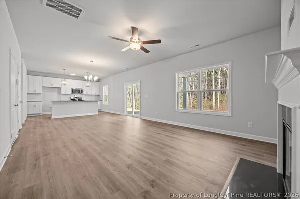 a view of a backyard of the house