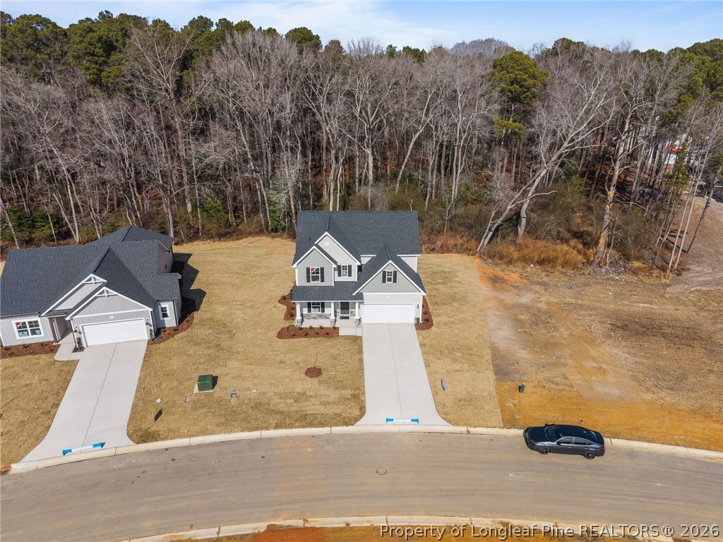155 Michter Street Vass, NC 28394 - Photo 10 of 46 an aerial view of a house with a yard