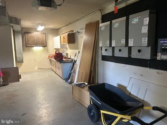 a room with gym equipment and a table