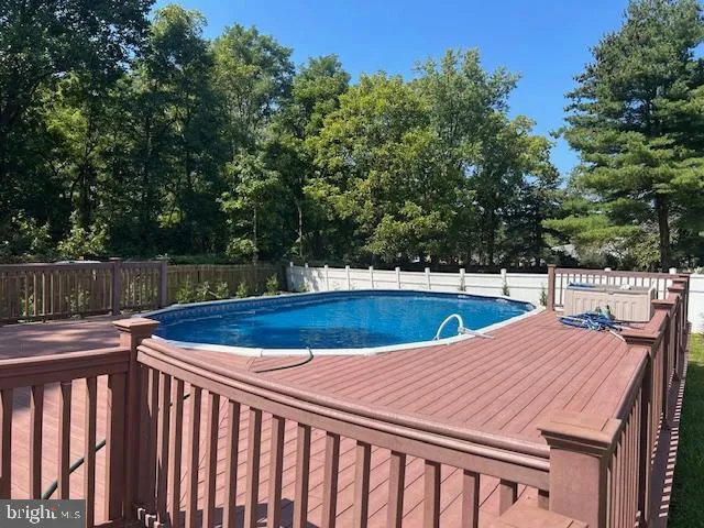 a view of an outdoor space and swimming pool