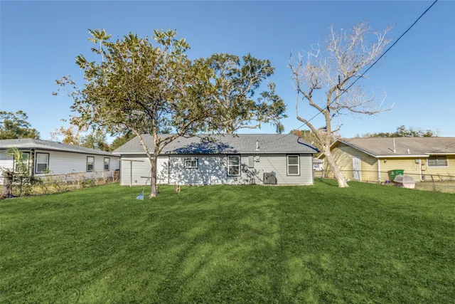 a house view with a garden space
