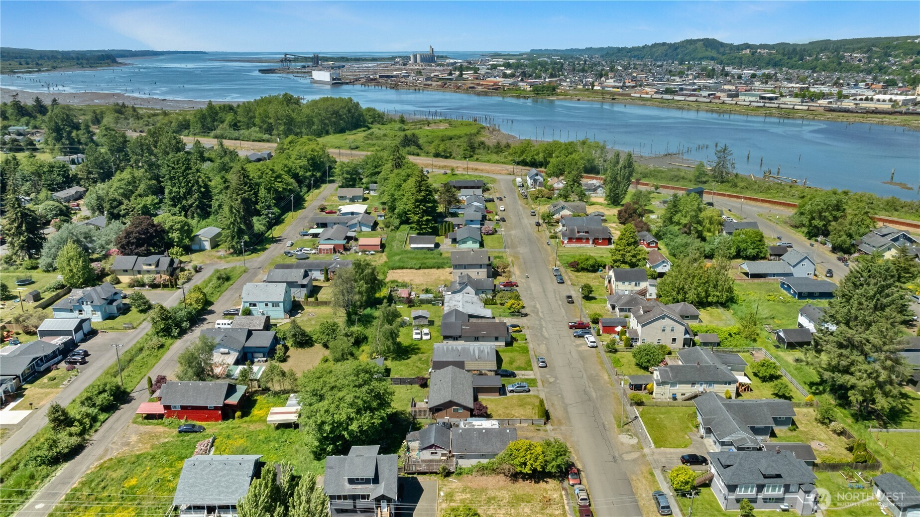 1105 West Perry Street Aberdeen, WA 98520 - Photo 18 of 20 an aerial view of ocean with residential house with outdoor space