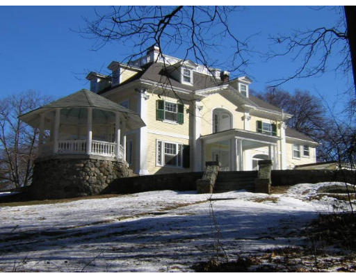1 Old England Road Ipswich, MA 01938 - Photo 2 of 5 a front view of a house with a yard