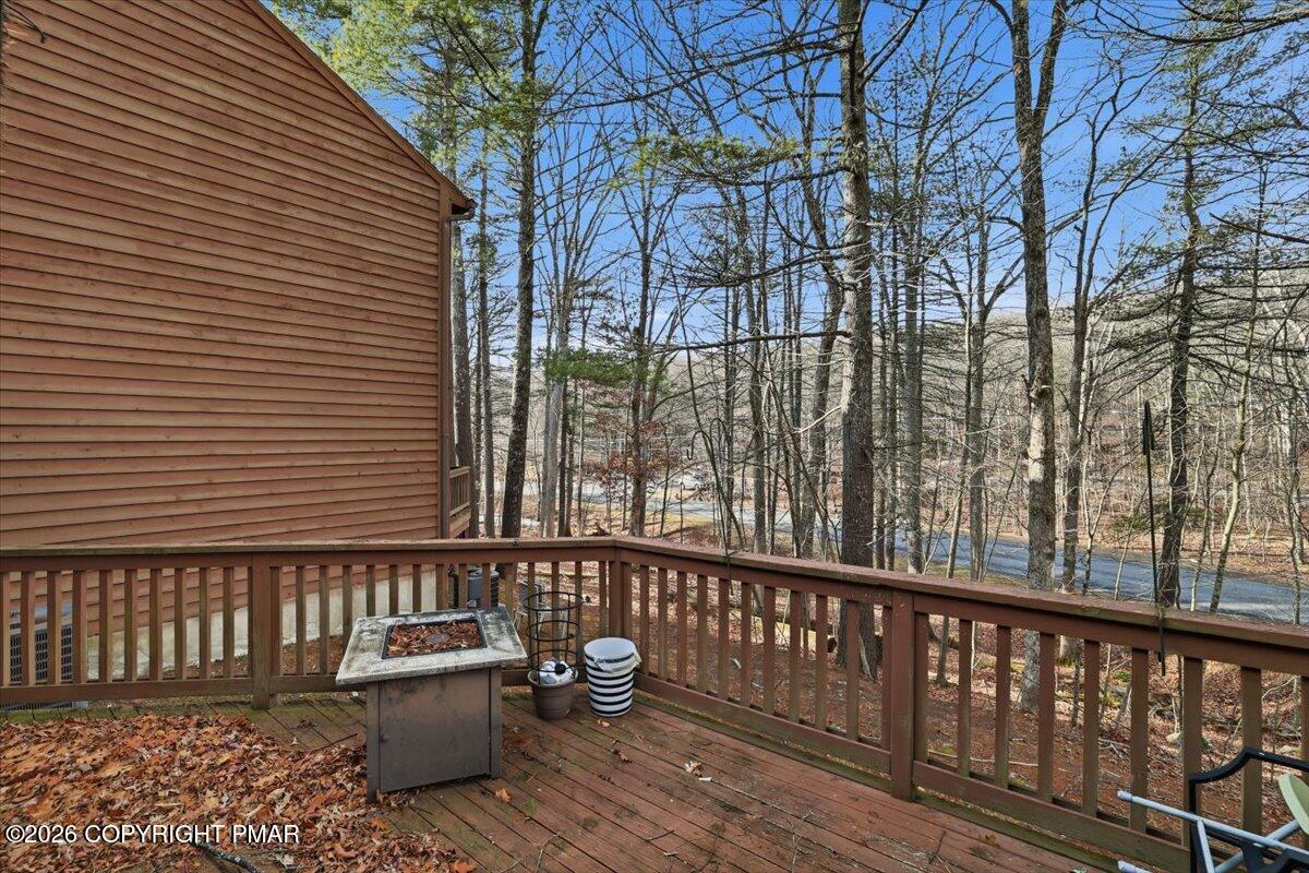 518 Wales Court Bushkill, PA 18324 - Photo 16 of 18 a view of a wooden roof deck