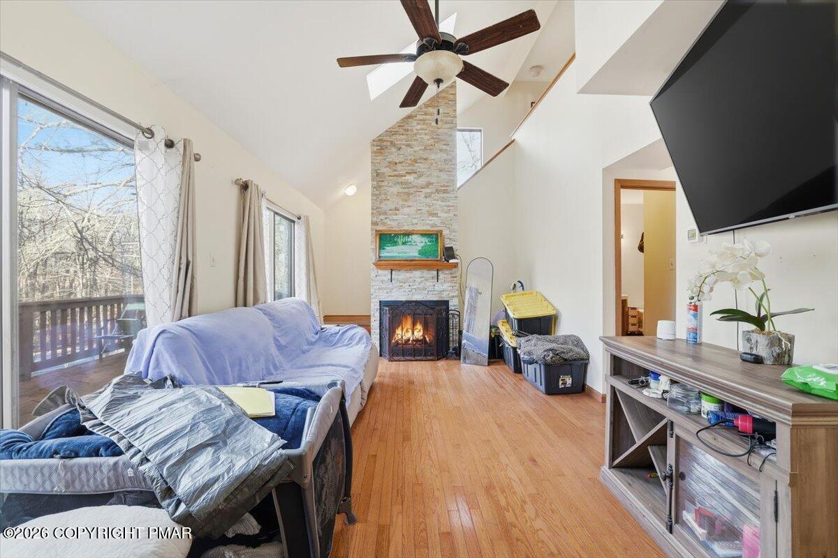 518 Wales Court Bushkill, PA 18324 - Photo 6 of 18 a living room with furniture and a fireplace