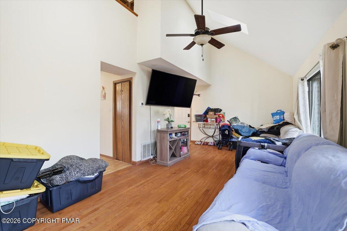 518 Wales Court Bushkill, PA 18324 - Photo 9 of 18 a living room with furniture and a flat screen tv