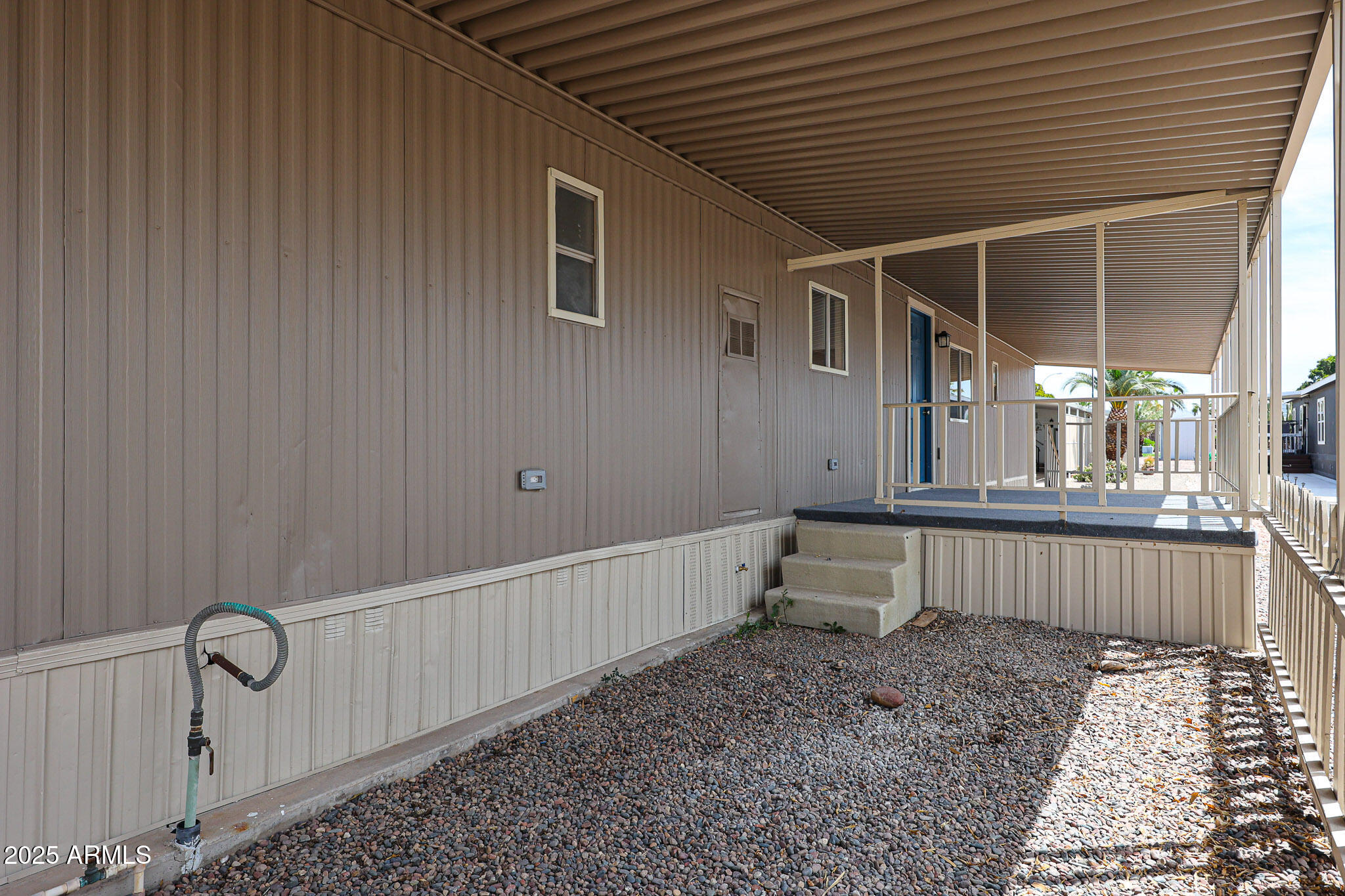 8600 East Broadway Road, Unit 53 Mesa, AZ 85208 - Photo 20 of 29 a house view with a backyard space