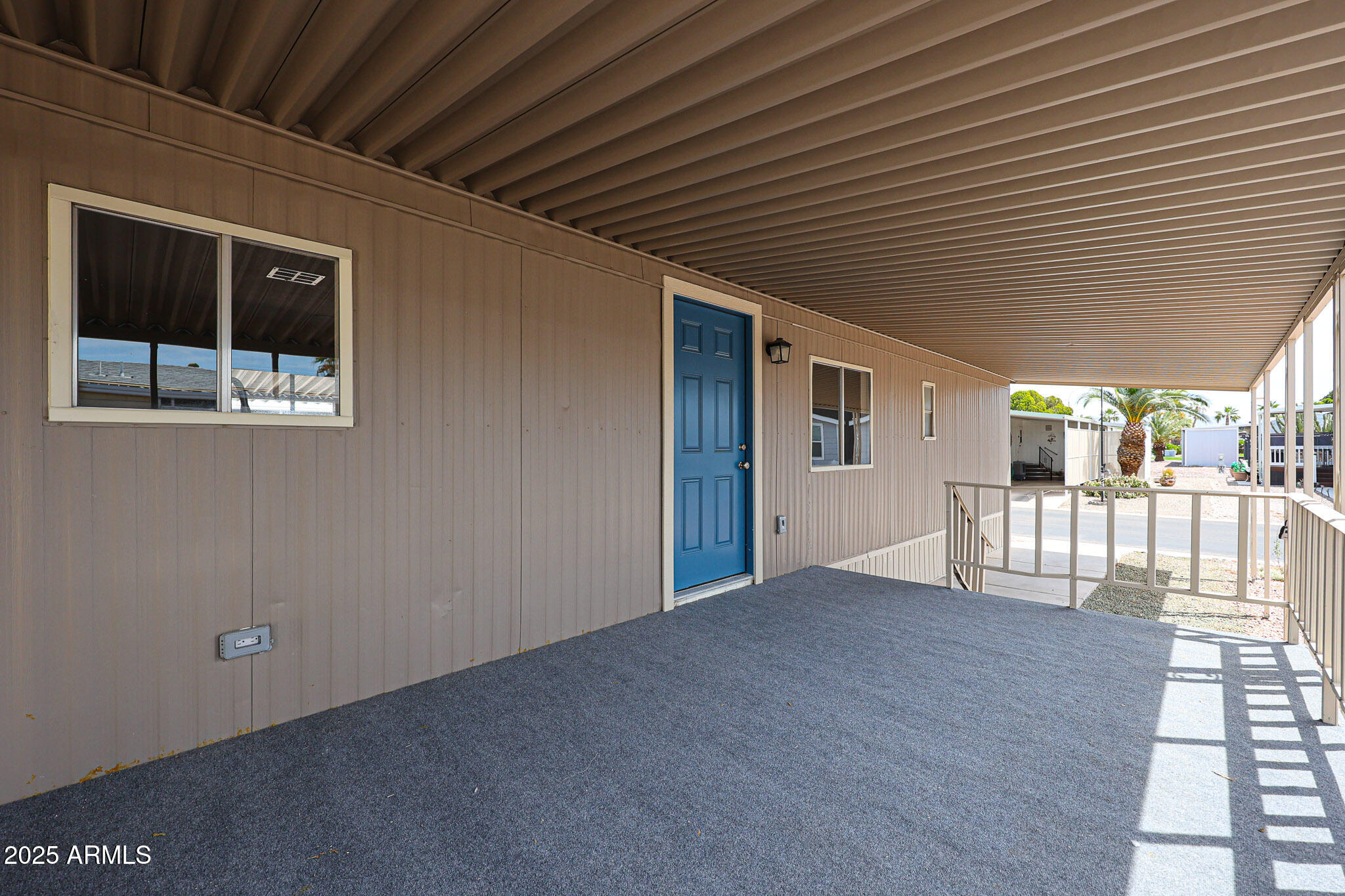 8600 East Broadway Road, Unit 53 Mesa, AZ 85208 - Photo 8 of 29 a view of backyard with a deck