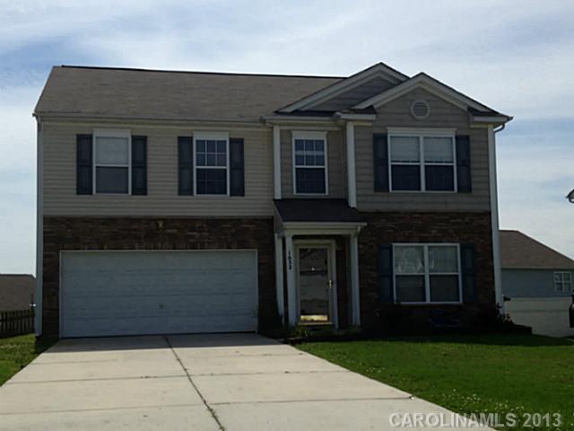 1632 Rustic Arch Way Huntersville, NC 28078 - Photo 1 of 16 a front view of a house with a garden