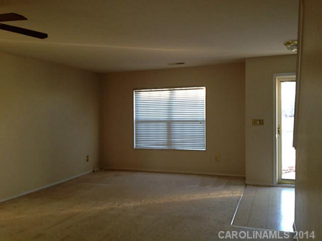 1632 Rustic Arch Way Huntersville, NC 28078 - Photo 6 of 16 a view of an empty room with a window