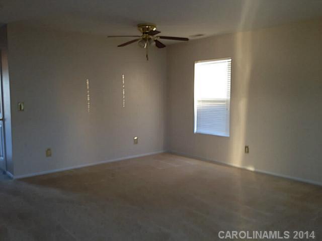 1632 Rustic Arch Way Huntersville, NC 28078 - Photo 7 of 16 a view of a room that has a window in it