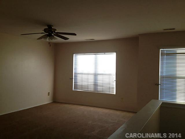 1632 Rustic Arch Way Huntersville, NC 28078 - Photo 8 of 16 a view of an empty room with a window