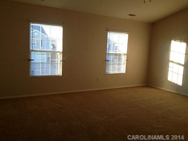 1632 Rustic Arch Way Huntersville, NC 28078 - Photo 9 of 16 an empty room with a window