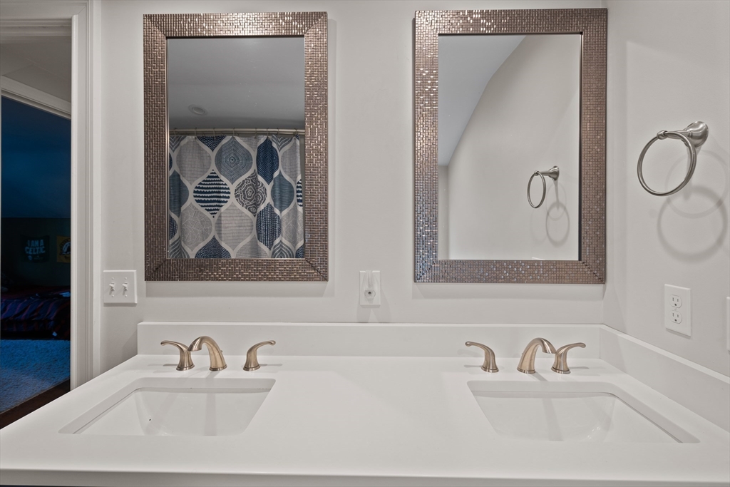 2 Woodbrier Road Topsfield, MA 01983 - Photo 17 of 29 a bathroom with a sink and a mirror