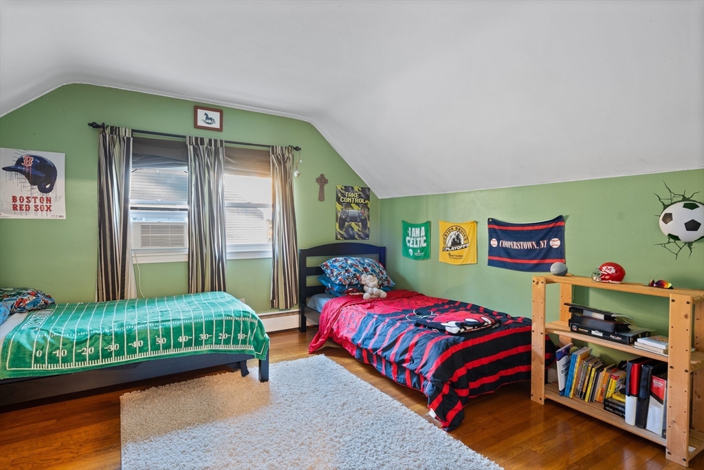 2 Woodbrier Road Topsfield, MA 01983 - Photo 18 of 29 a bedroom with a bed and a window