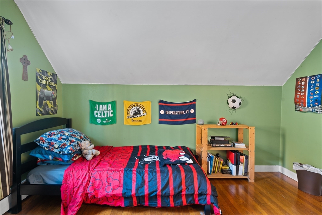 2 Woodbrier Road Topsfield, MA 01983 - Photo 19 of 29 a bedroom with a bed and dresser