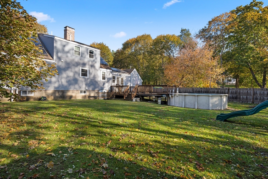 2 Woodbrier Road Topsfield, MA 01983 - Photo 28 of 29 a view of a house with a big yard and large trees
