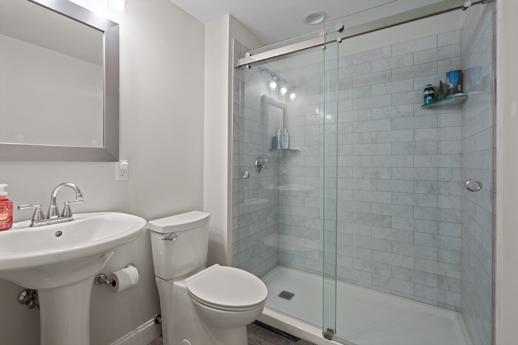 2 Woodbrier Road Topsfield, MA 01983 - Photo 6 of 29 a bathroom with a sink toilet and shower