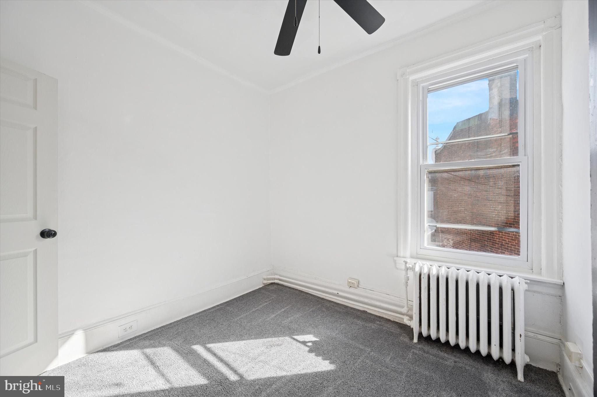 5262 Parkside Avenue Philadelphia, PA 19131 - Photo 5 of 14 an empty room with a window