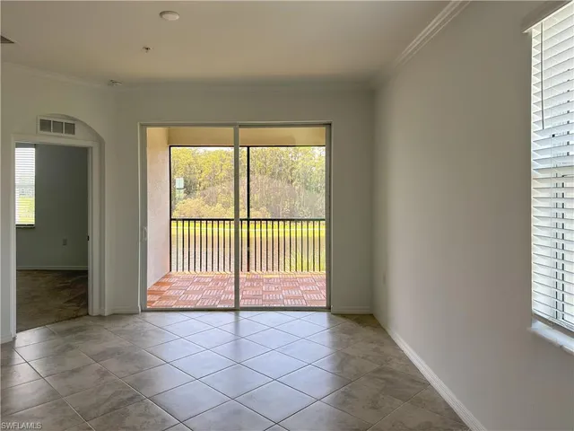 a view of a refrigerator in a room