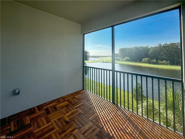 a view of a park with a palm trees