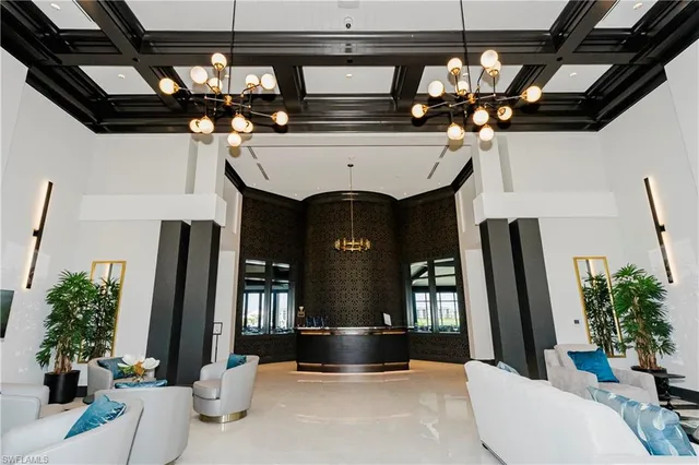 a view of a cafe with sitting area