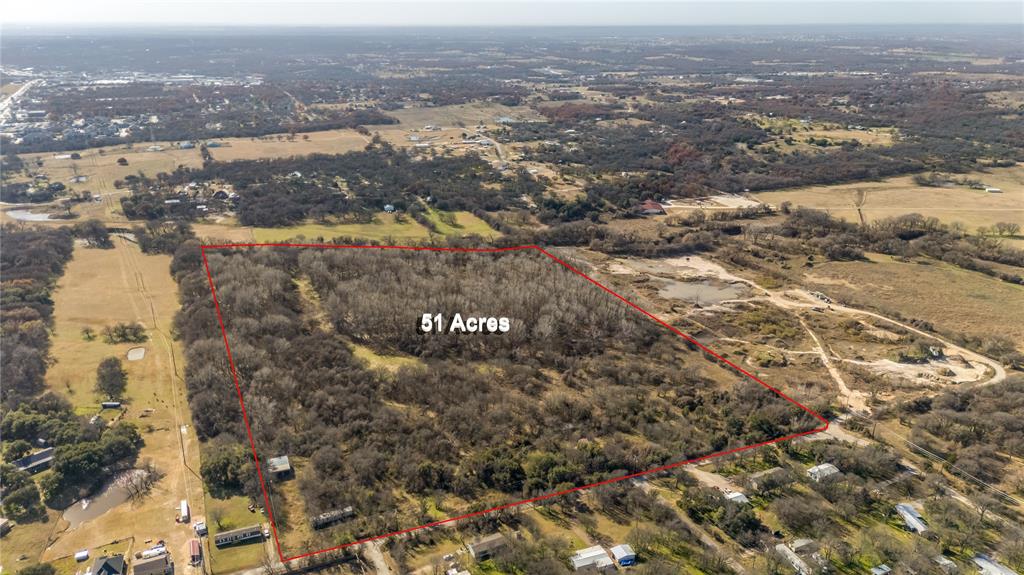 1620 West Timberlake Street, Unit C Azle, TX 76020 - Photo 5 of 12 an aerial view of residential building and lake view