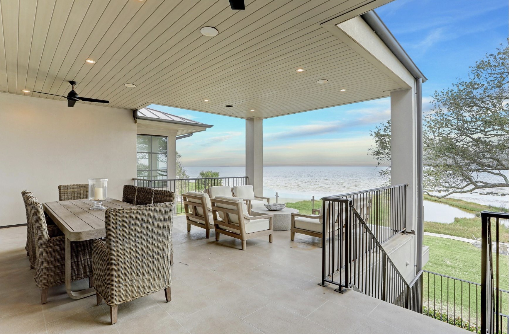 633 Quintana Roo Place Seabrook, TX 77586 - Photo 12 of 47 Take in the beauty of the natural landscape as you watch the boats go by on your spacious terrace - one of many outdoor areas this home offers.