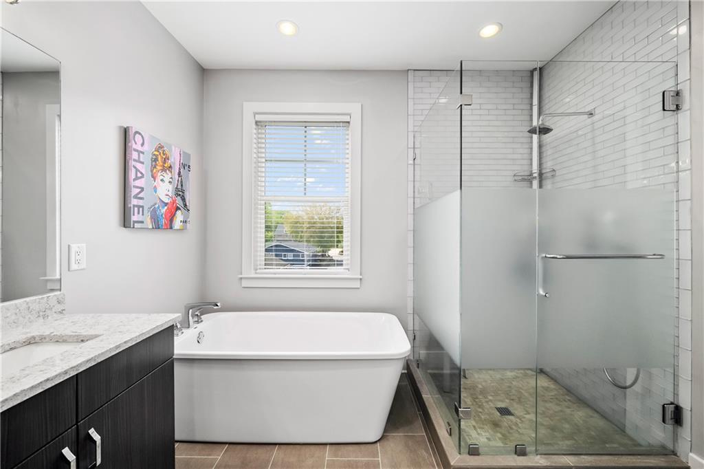 108 Canton Way Roswell, GA 30075 - Photo 22 of 46 a bathroom with a granite countertop sink a toilet and shower