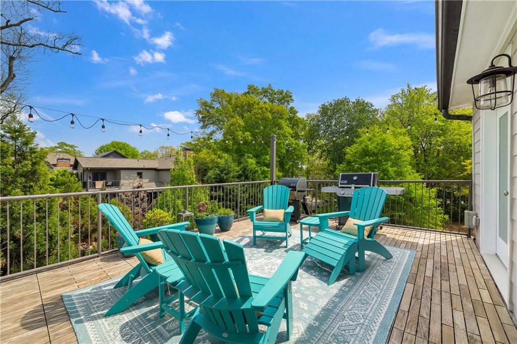 108 Canton Way Roswell, GA 30075 - Photo 3 of 46 a view of a chairs and table on the balcony