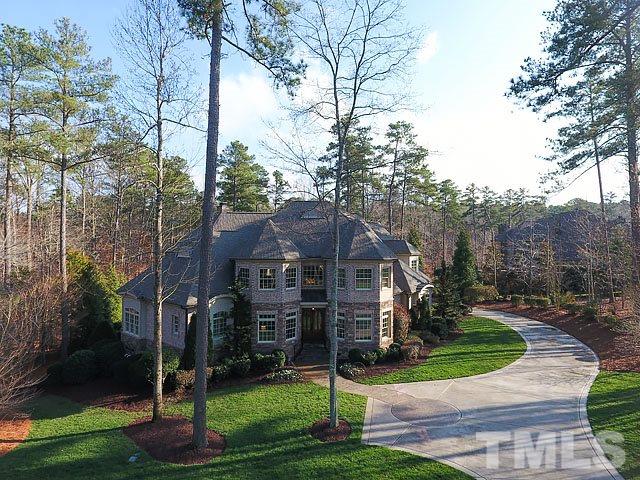 2921 Cone Manor Lane Raleigh, NC 27613 - Photo 2 of 25 a view of a house with a yard