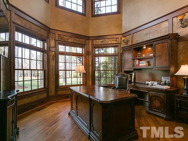 2921 Cone Manor Lane Raleigh, NC 27613 - Photo 11 of 25 a kitchen with stainless steel appliances granite countertop a stove and a sink